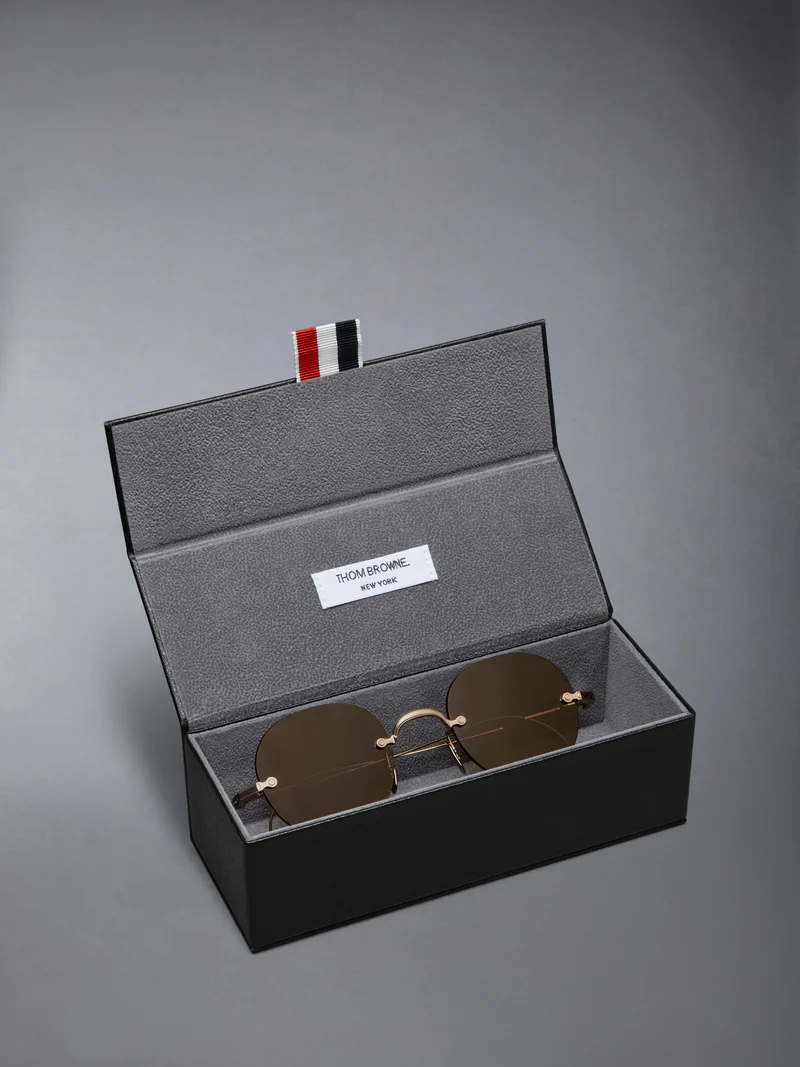 TITANIUM RIMLESS ROUND SUNGLASSES - Product Image
